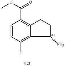 1H-Indene-4-carboxylic acid, 1-amino-7-fluoro-2,3-dihydro-, methyl ester, hydrochloride (1:1), (1S)- Structure